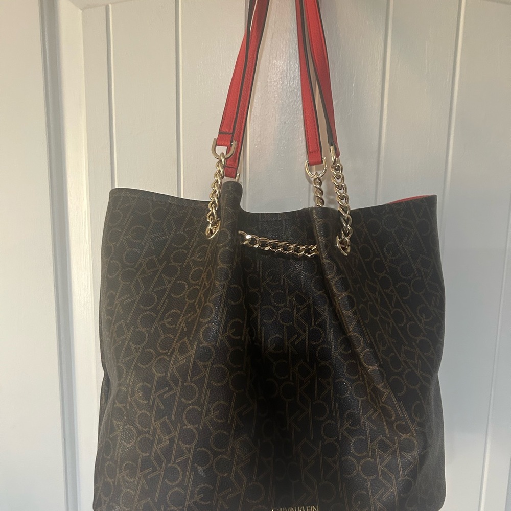 Calvin Klein Brown Logo Tote with Red Handles and Gold Chain Accents